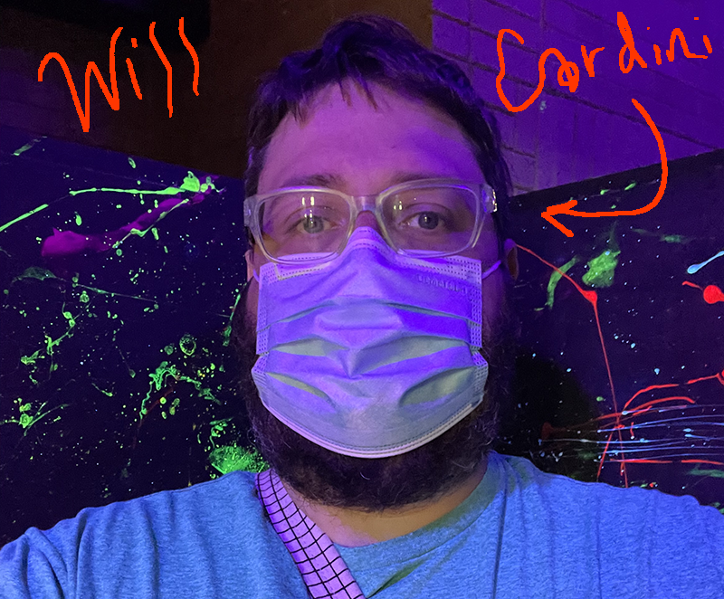 Photo of Will Cardini wearing a disposable face mask